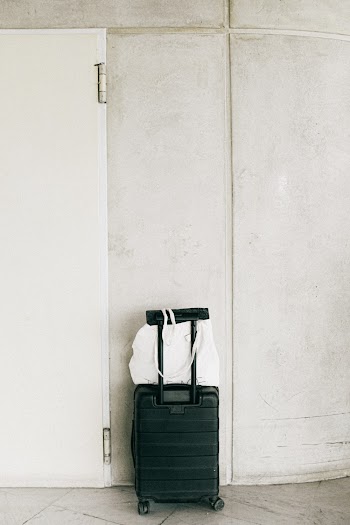 Black Luggage Bag Beside Door