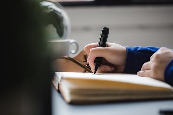 Black Marker And Notebook