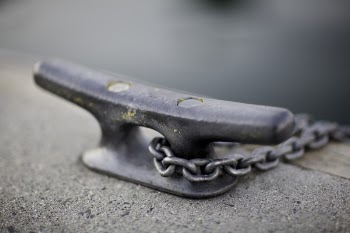 Black Metal Part With Metal Chain on Selective Focus Photo
