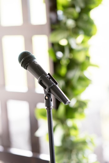 Black Microphone With Stand in Room Selective Focus Photography