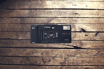 Black Milc on Brown Panel