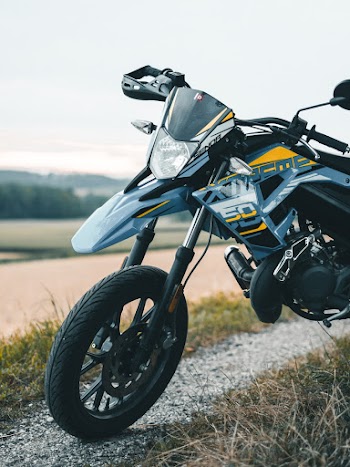 Black Motorcycle Parked Near Field