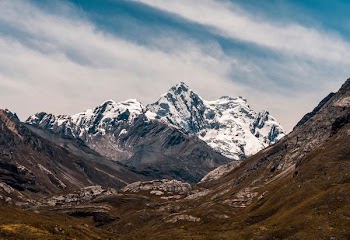black mountain covered by snow