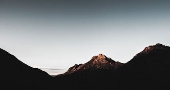 black mountain during daytime