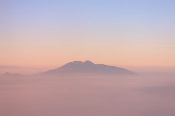 black mountain under blue sky at daytime