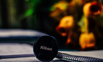 Black Nikon Camera Lens Cover
