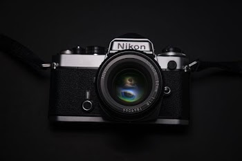 black Nikon DSLR camera