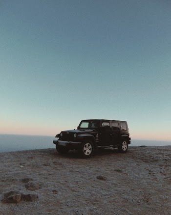 Black Off-road Vehicle on Brown Surface