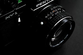 black Pentax SLR camera