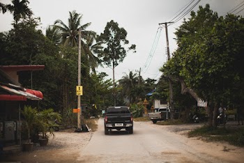 Black Pickup Truck on Road 