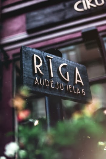 Black Signage in Shallow Focus Photography