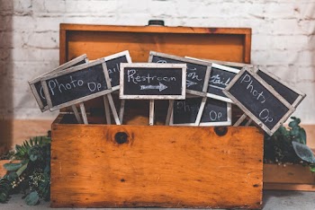 Black Signages on Wooden Chest Box