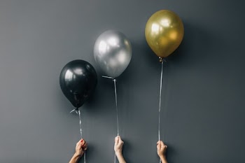 Black, Silver, And Gold Balloons