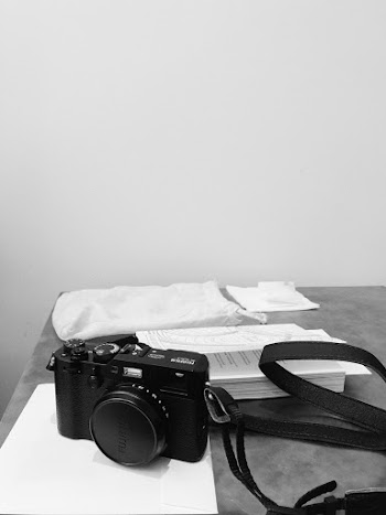 Black Slr Camera on Table