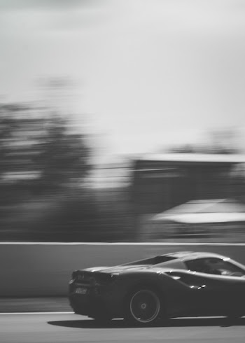 Black Sports Coupe on Road