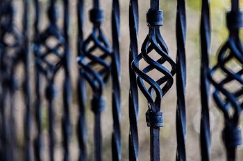 Black Steel Fence during Daytime