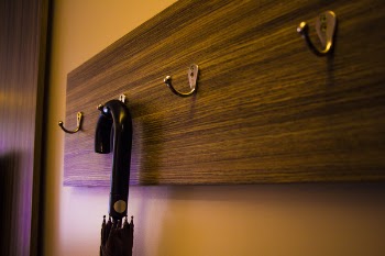 Black Umbrella Hang on the Floating Hook Rack