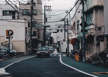 black vehicle on asphalt road