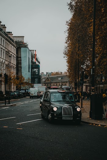 Black Vehicle Parked on Street