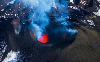 black volcano during daytime