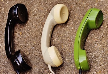 Black White and Green Phones