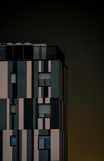 Black, White, and Teal Building