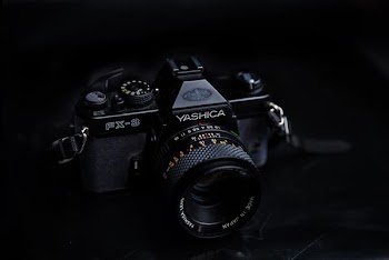 black Yashica PX-3 DSLR camera on focus photo