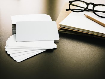 Blank corporate identity business card package on worker table Free Photo