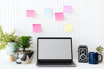 Blank laptop screen on a green workstation | Free stock photo | High Resolution image