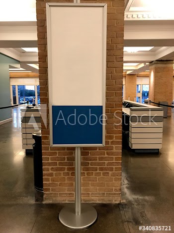 Blank white sign indoors