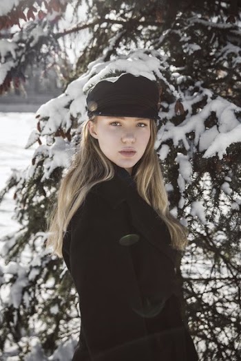 Blond Woman With Winter Pine