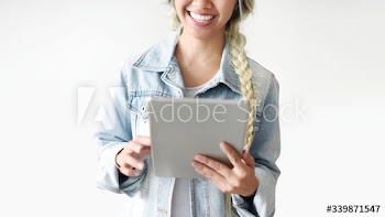 Blonde Asian woman with a tablet