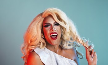 Blonde Drag Performer Laughing