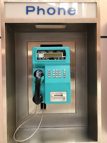 Blue and Black Coin-operated Telephone