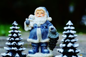 Blue and White Santa Claus Figurine Close-up Photography