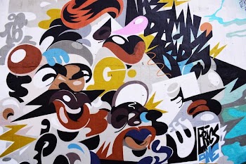 blue, black, and white graffiti artwork