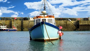 Blue Boat on Water