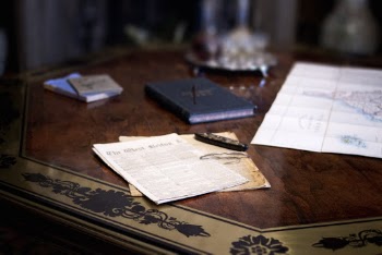 Blue Book on Table