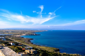Blue Calm Body of Water Under Blue and White Sky