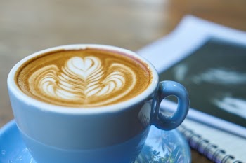 Blue Ceramic Cup Filled With Coffee