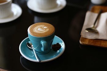 Blue Ceramic Mug Filled With Coffee