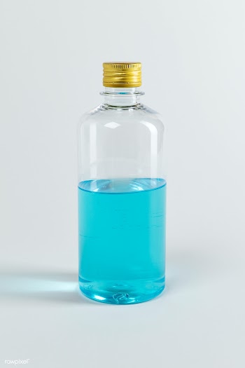 Blue ethanol alcohol bottle | Free  photo - 2296911