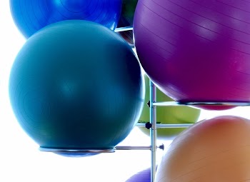 Blue Exercising Ball on Stainless Steel Exercising Ball Rack