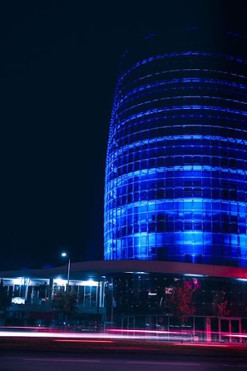 blue high-rise building photography at night
