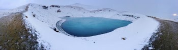 Blue Lake in the Middle of Snowfield
