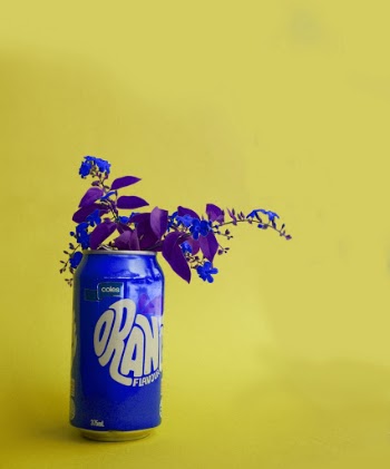 Blue Leafed Plant on Blue Beverage Can