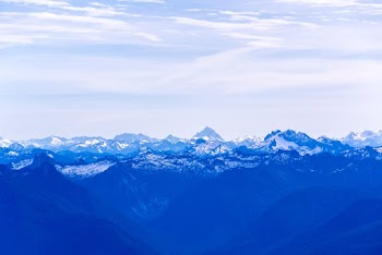 Blue Mountains Under White Clouds