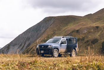 Blue Nissan Suv