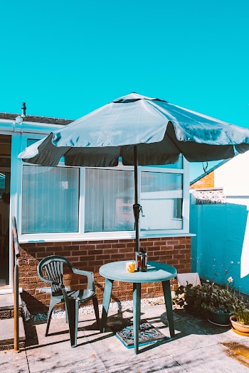 Blue Parasol on Table