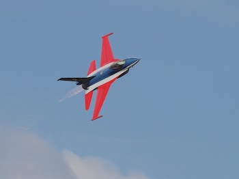 Blue Red Black and White Jet Plane on Air